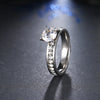 Silver Plated Fashionable Engagement Ring for Women with Circle Zircons and One Big Central Clear Zircon