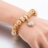 Crystal Heart Charm & Gold Beads Bracelet