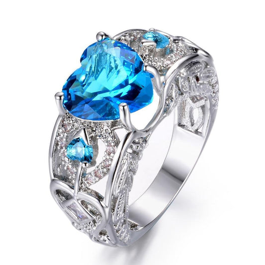 Silver Plated Engagement Ring for Women with Delicate Heart-Shaped Blue Birthstone and Elegant Design