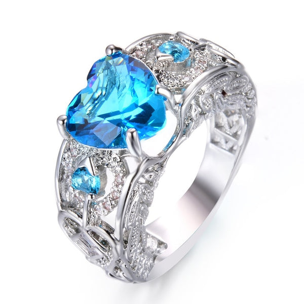 Silver Plated Engagement Ring for Women with Delicate Heart-Shaped Blue Birthstone and Elegant Design
